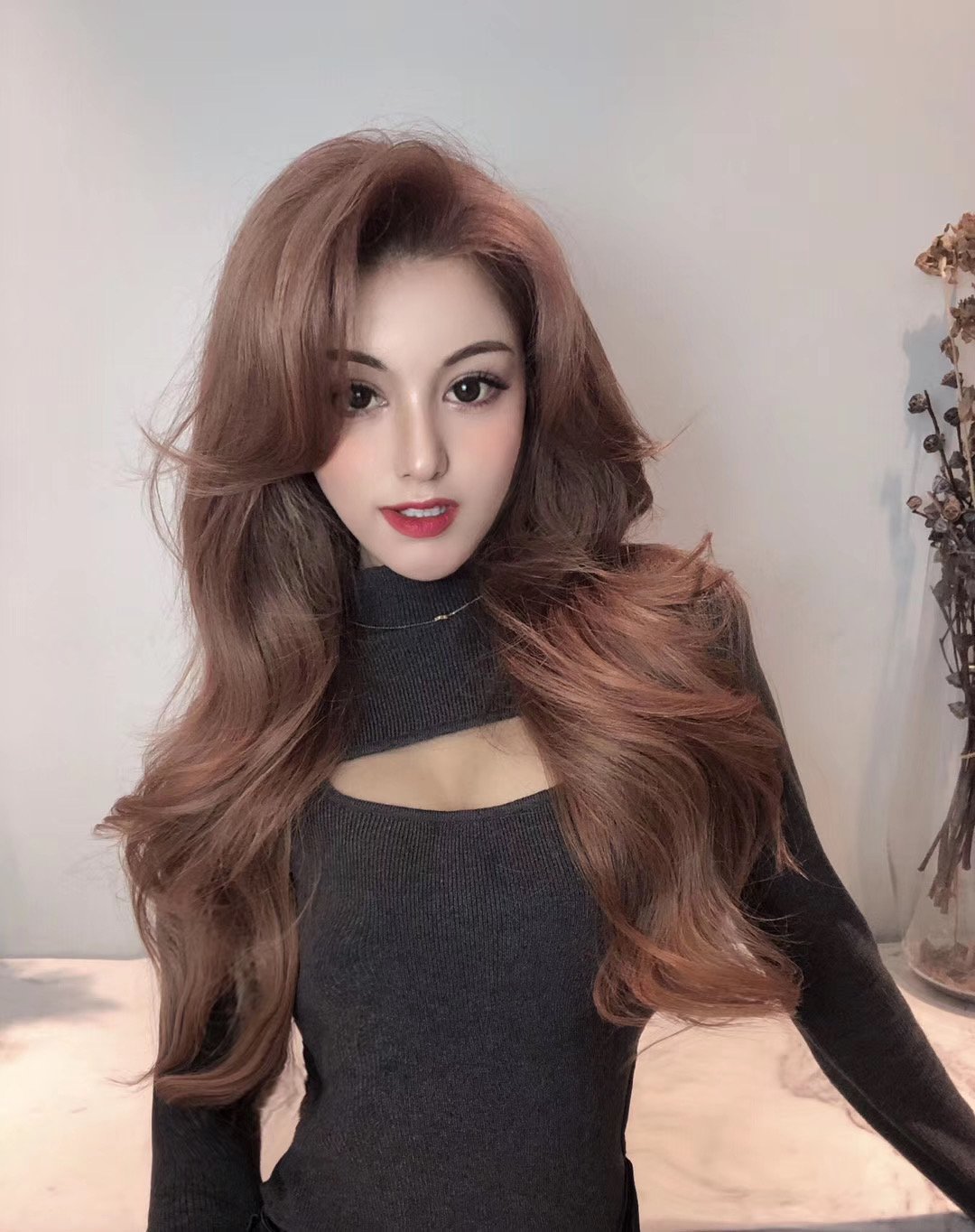 Warm brown wavy feather extension