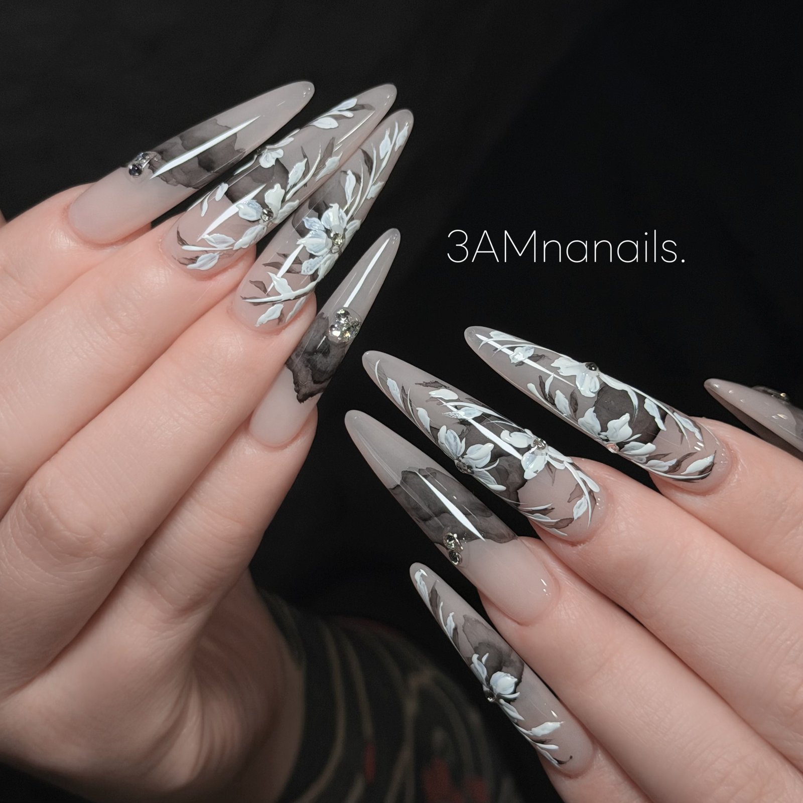 Hand-drawn nail art by Nana